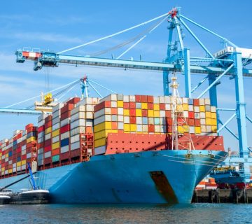 Arge container ship in port on a clear summer day